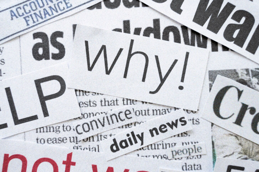 emotional language in headlines shown through layered newspaper text